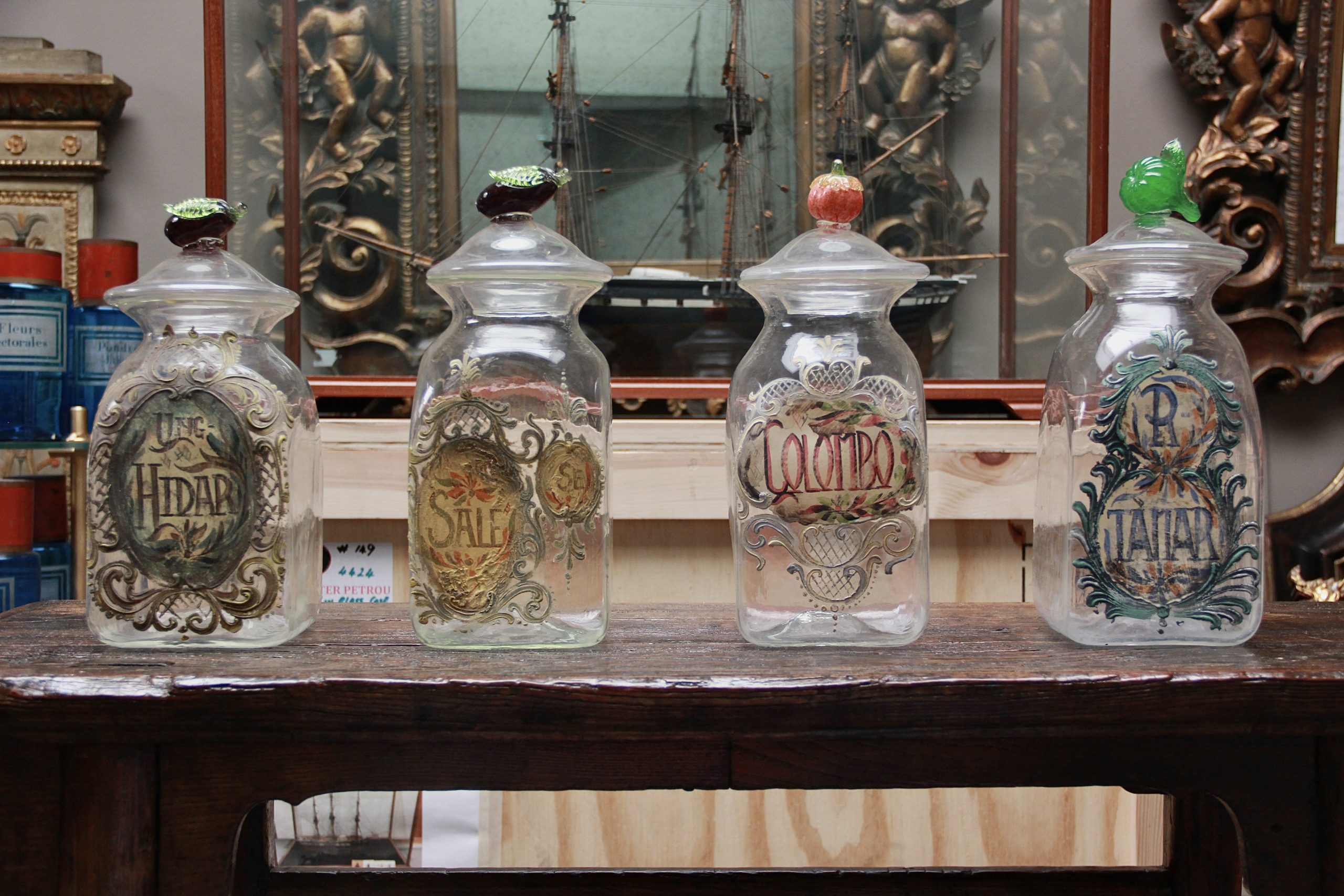 Set of Four Italian Glass Apothecary Jars with Fruit Finials