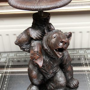 A rare Swiss Carved Black Forest Linden Wood Bear Stool Circa 1900.