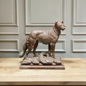 A Swiss Carved Black Forest Linden Wood model of an alert Borzoi Circa 1900