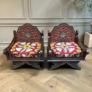 A Pair of Carved and Polychrome Hardwood Throne Chairs